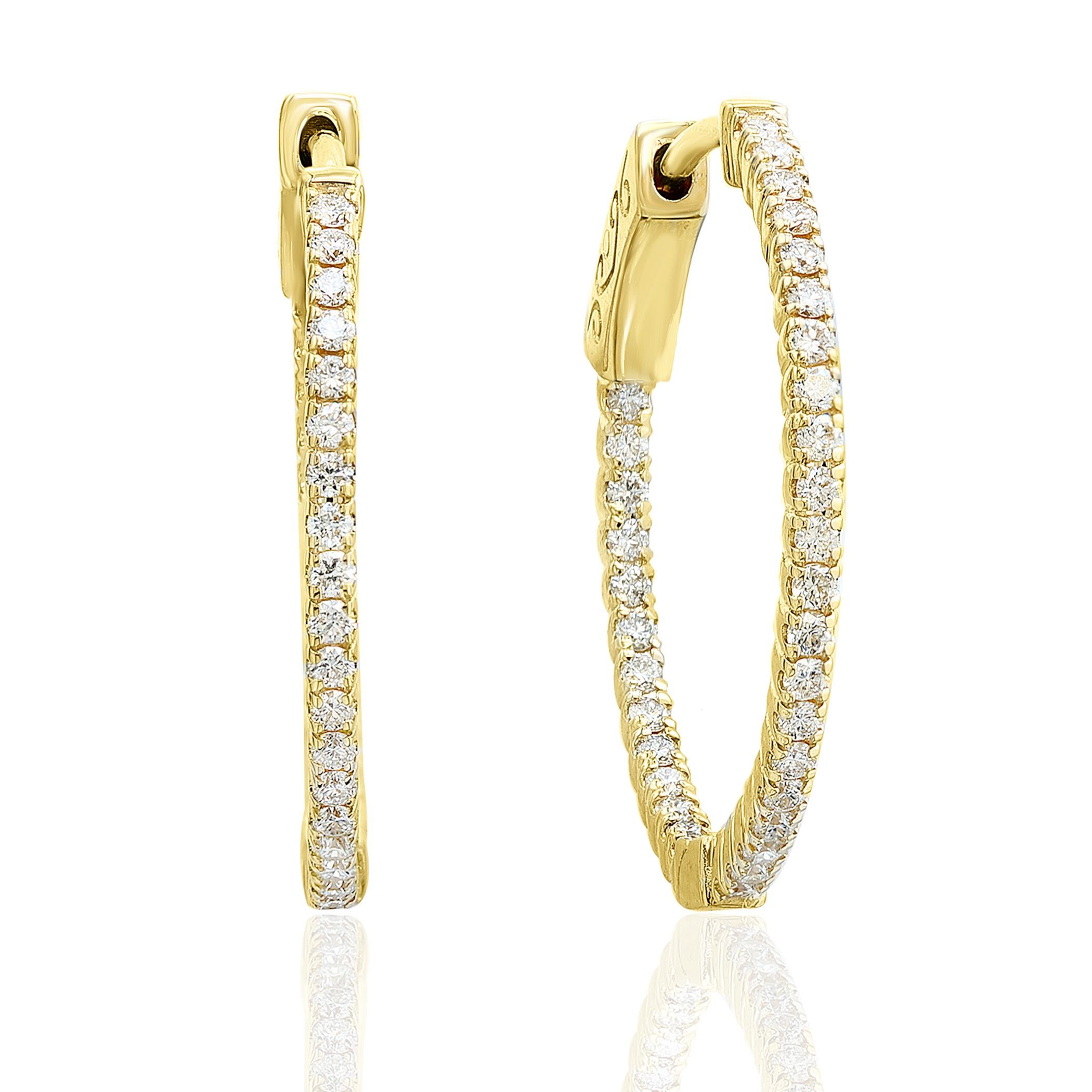 50-round brilliant diamonds

14k Yellow Gold

Total carat weight: 0.50 ct

GHSI1 quality (natural diamonds)

Prong setting

0.75mm width (hoop earring)
Safety push button clasp
In and out diamonds

Grey baroque pearls hanging by a loop (