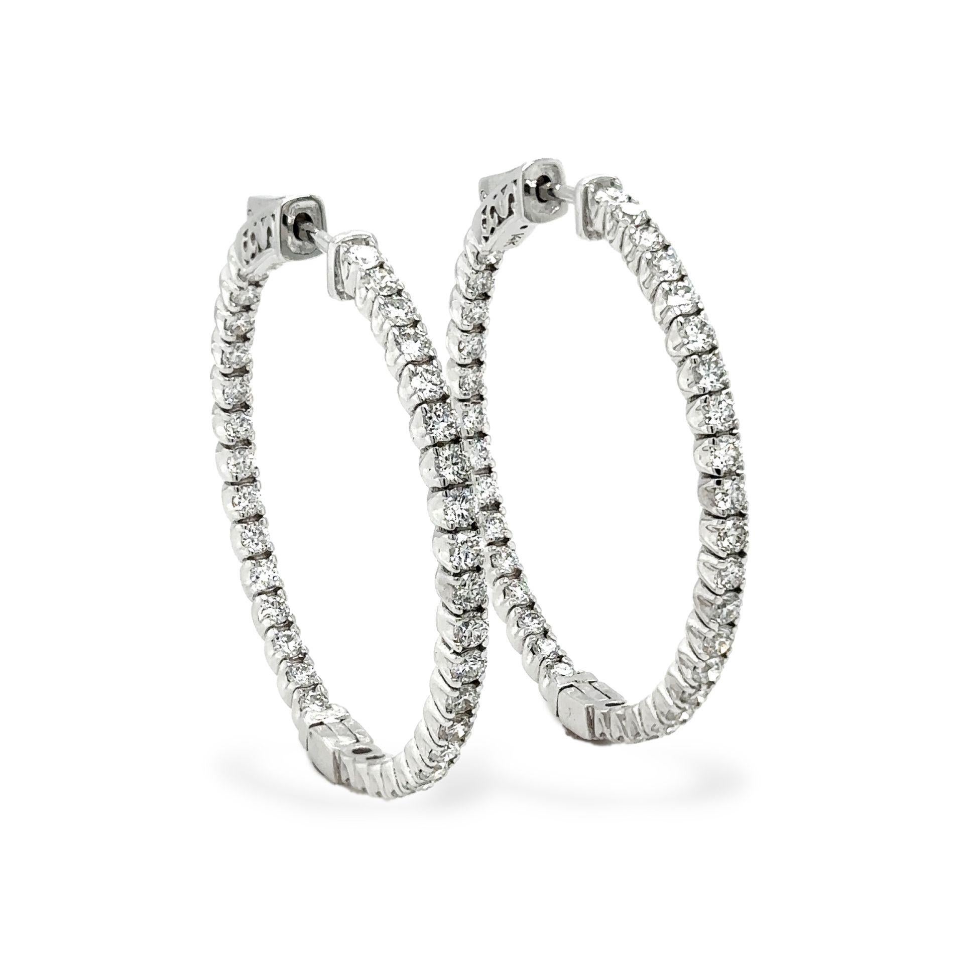 Diamond Hoop Earrings 14K White Gold 2.72 carats

STUNNING!!!

Diamond weighs 2.72 carat Total Weight

Diamonds are G I in Color and SI in Clarity

Hoop measurement: 35.0mm

Set in 14K White Gold

Item #: J5794