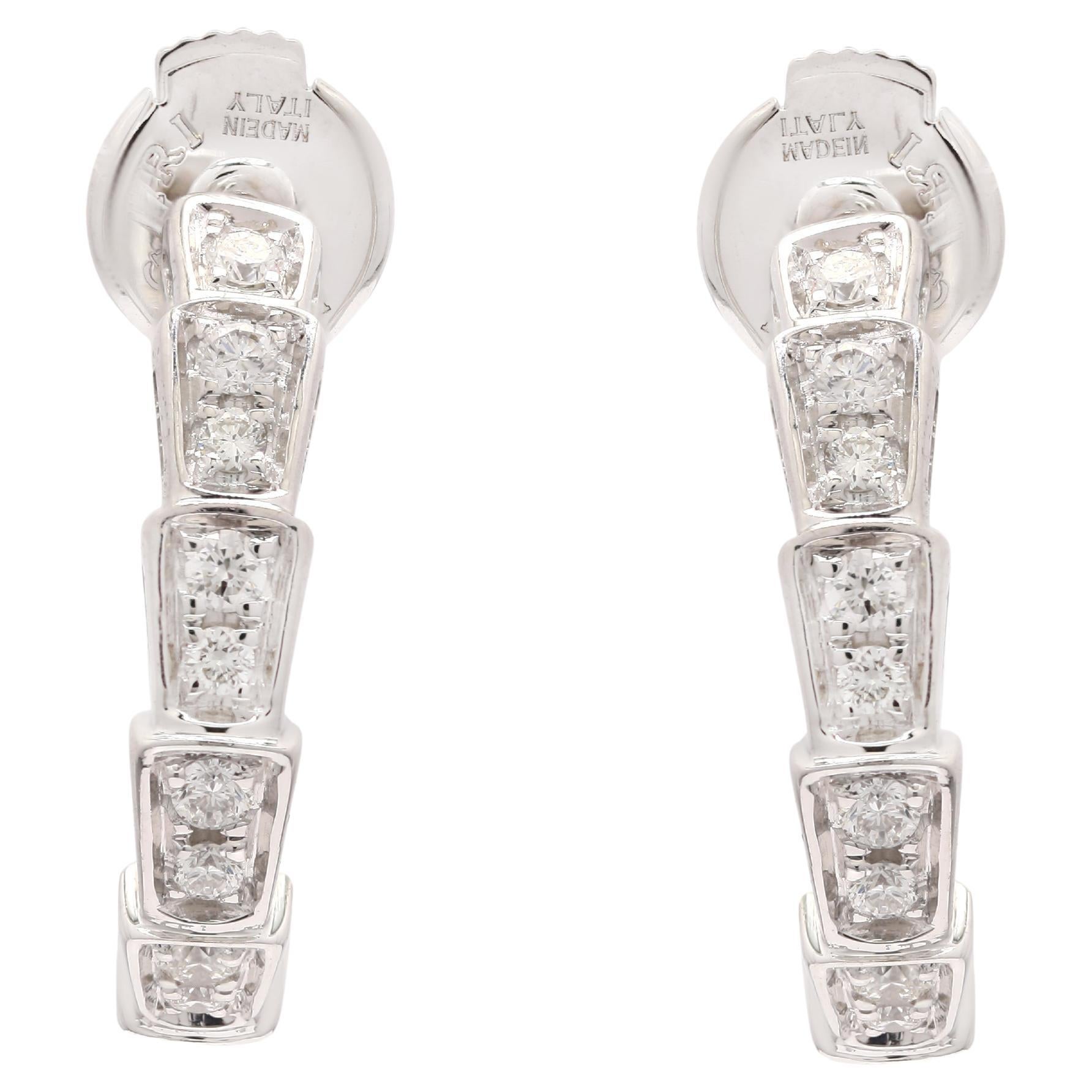 You shall need this designer diamond c-hoop earrings to make a statement with your look. These earrings create a sparkling, luxurious look featuring round cut gemstone.
If you love to gravitate towards unique styles, this piece of jewelry is perfect