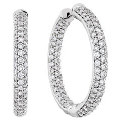 Boucles d'oreilles anneau en or blanc 18 carats et diamants