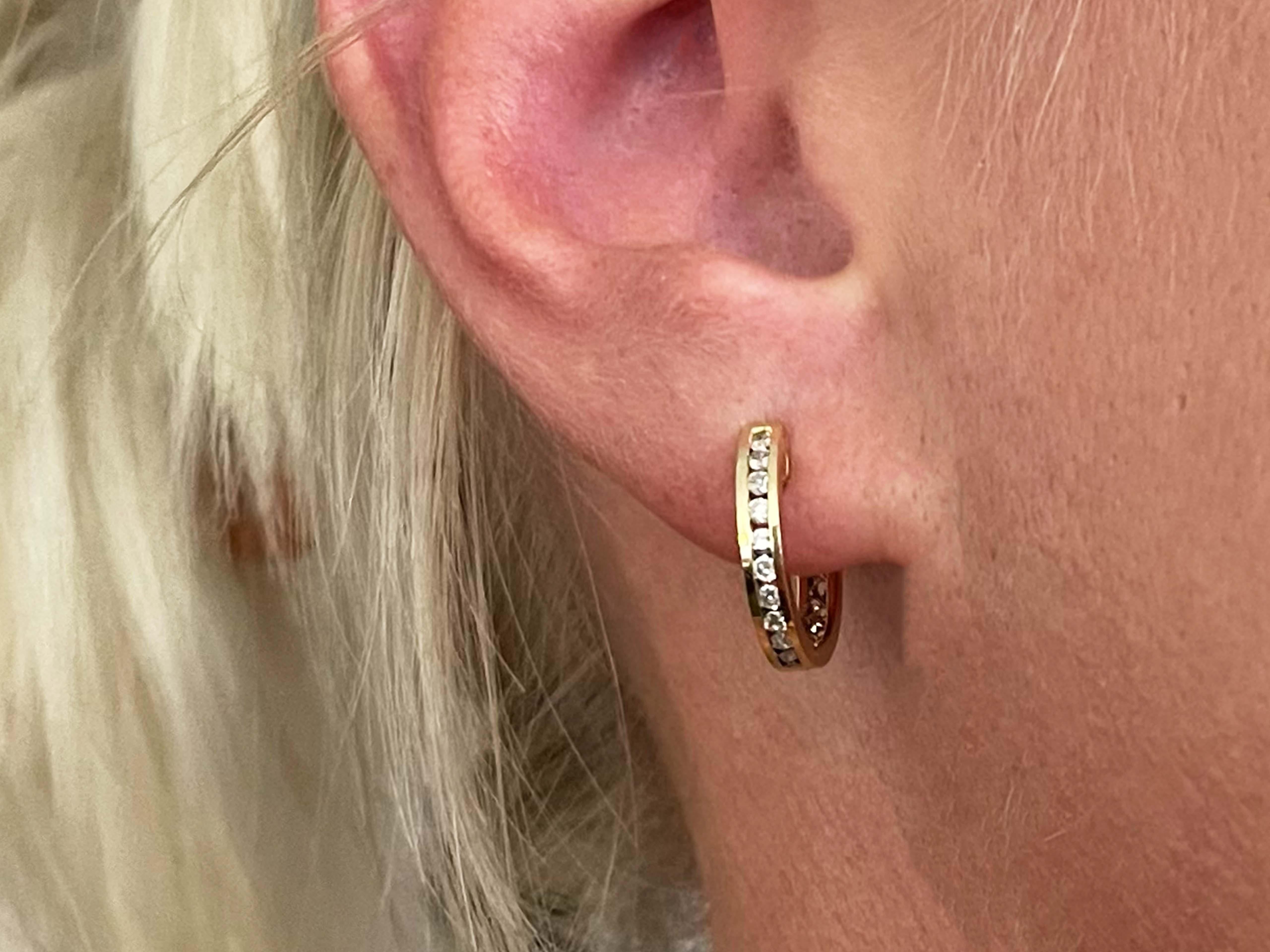 Earrings Specifications:

Metal: 18k Yellow Gold

Earring Diameter: 15 mm

Total Weight: 3.4 Grams

Diamonds: 20

Setting: Channel

Diamond Color: G-H

Diamond Clarity: SI1-I1

Diamond Carat Weight: 0.20 carats
​
​Stamped: 