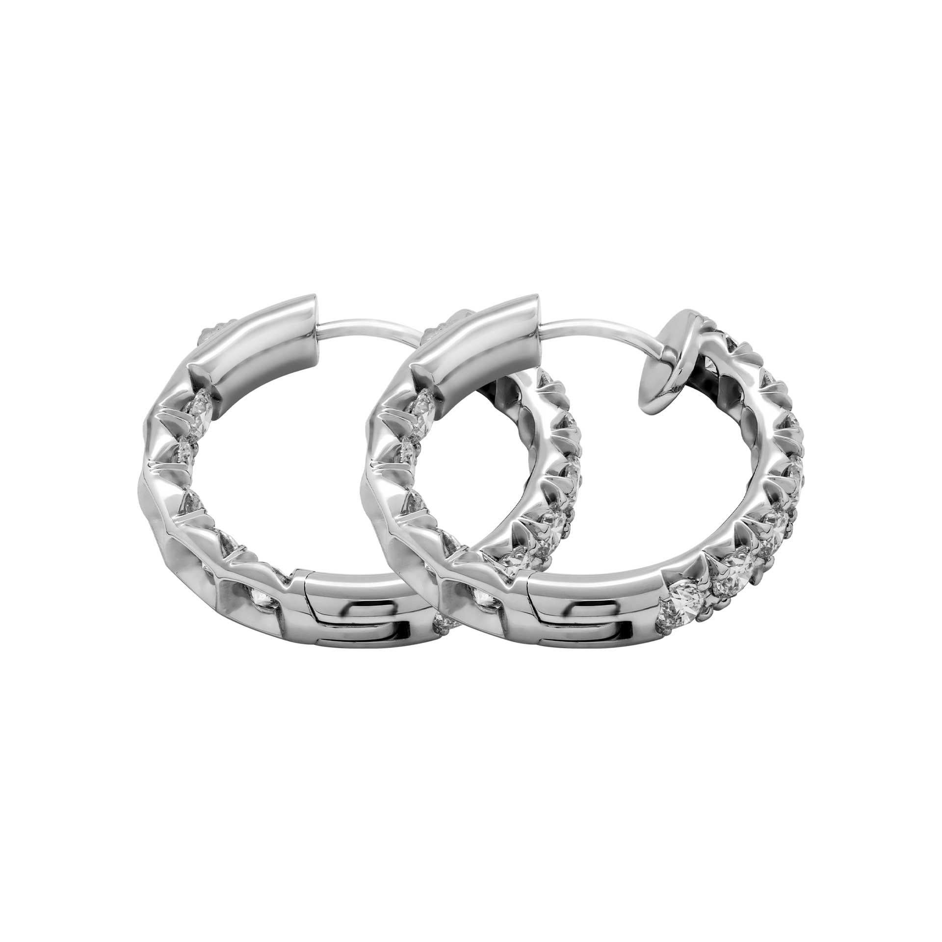 Diamond Hoop Earrings 
Mounted in 14K White Gold with 4.7ct of White Full Brilliant Cut Round diamonds 
Totaling 24 stones and custom made lock , super secure and discrete. 

Diameter: 25mm
Width: 4.7mm
Weight: 8.12gr 