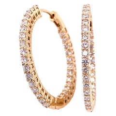 Orecchini a cerchio con diamanti rotondi da 0,89 carati in oro giallo 14 ct.