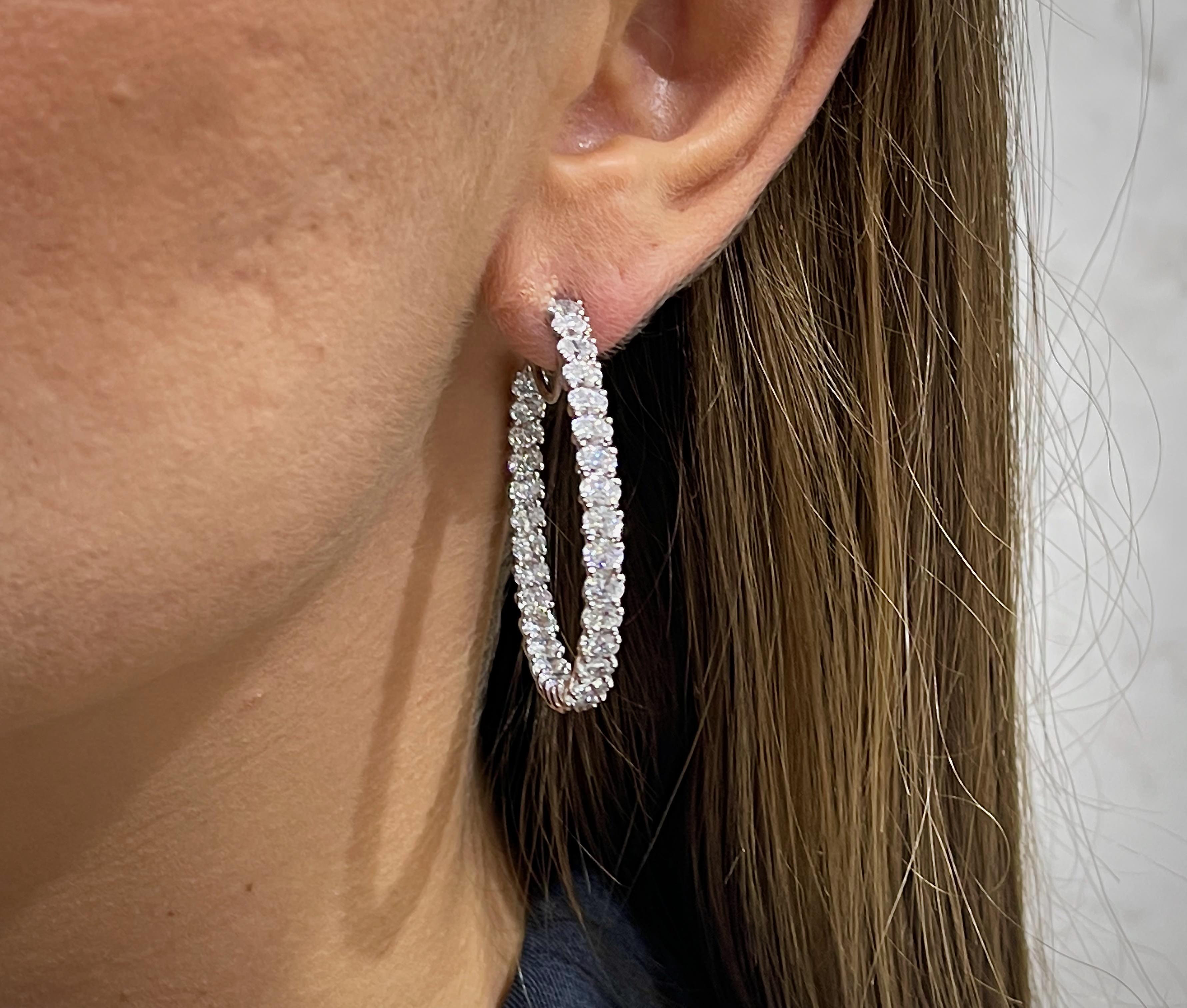 Beautiful Diamond Hoop Earrings Set With 64 Oval Cut Diamonds. It comes with an appraisal by GIA G.G.
Total Carat Weight is 9.33 Carats
Diamonds Color is F-G
Diamonds Clarity is VVS-VS
Metal is 18K White Gold