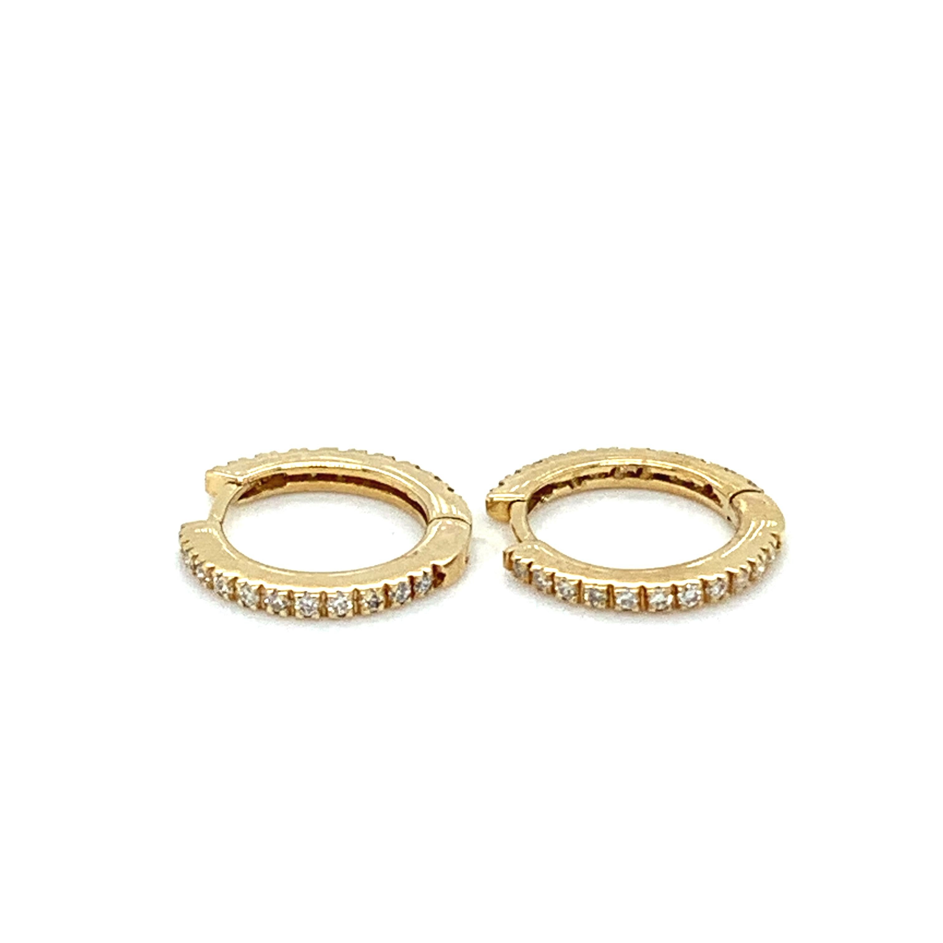 Diamond hoop earrings small 18k yellow gold
Round diamond cut eternity pave setting total diamond weight 0.42ct F colour VS1 clarity, hallmarked
Measurements approx 12mm width 1mm very fine petite hoop earrings 
Accompanied by valuation.