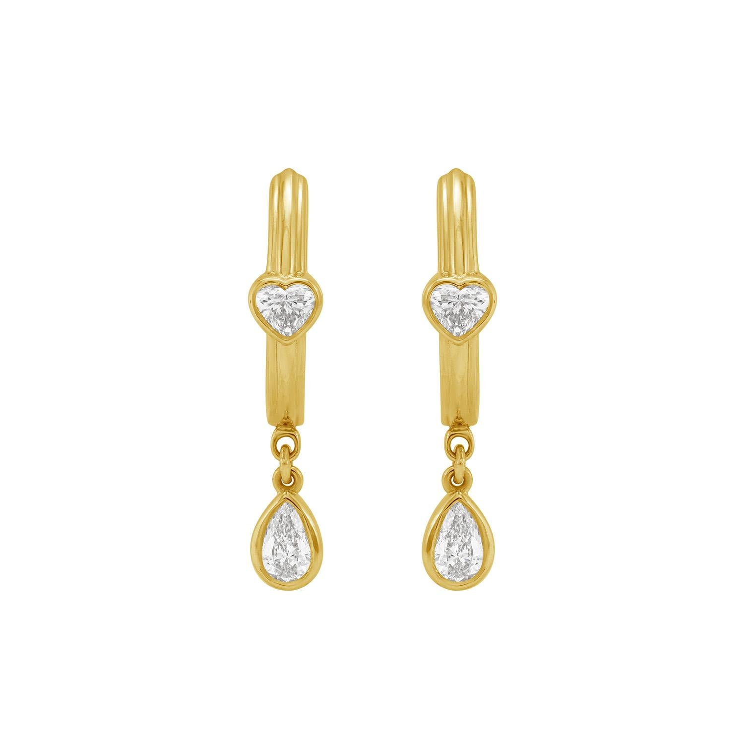 Classici e radiosi, questi orecchini a cerchio sono impreziositi da 0,65 carati di diamanti scintillanti e offrono un'eleganza senza tempo in un design elegante e versatile. Realizzati in oro 14KT, sono perfetti per la raffinatezza di tutti i giorni
