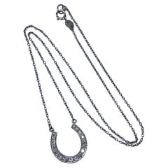Diamond horseshoe lucky pendant necklace In white gold