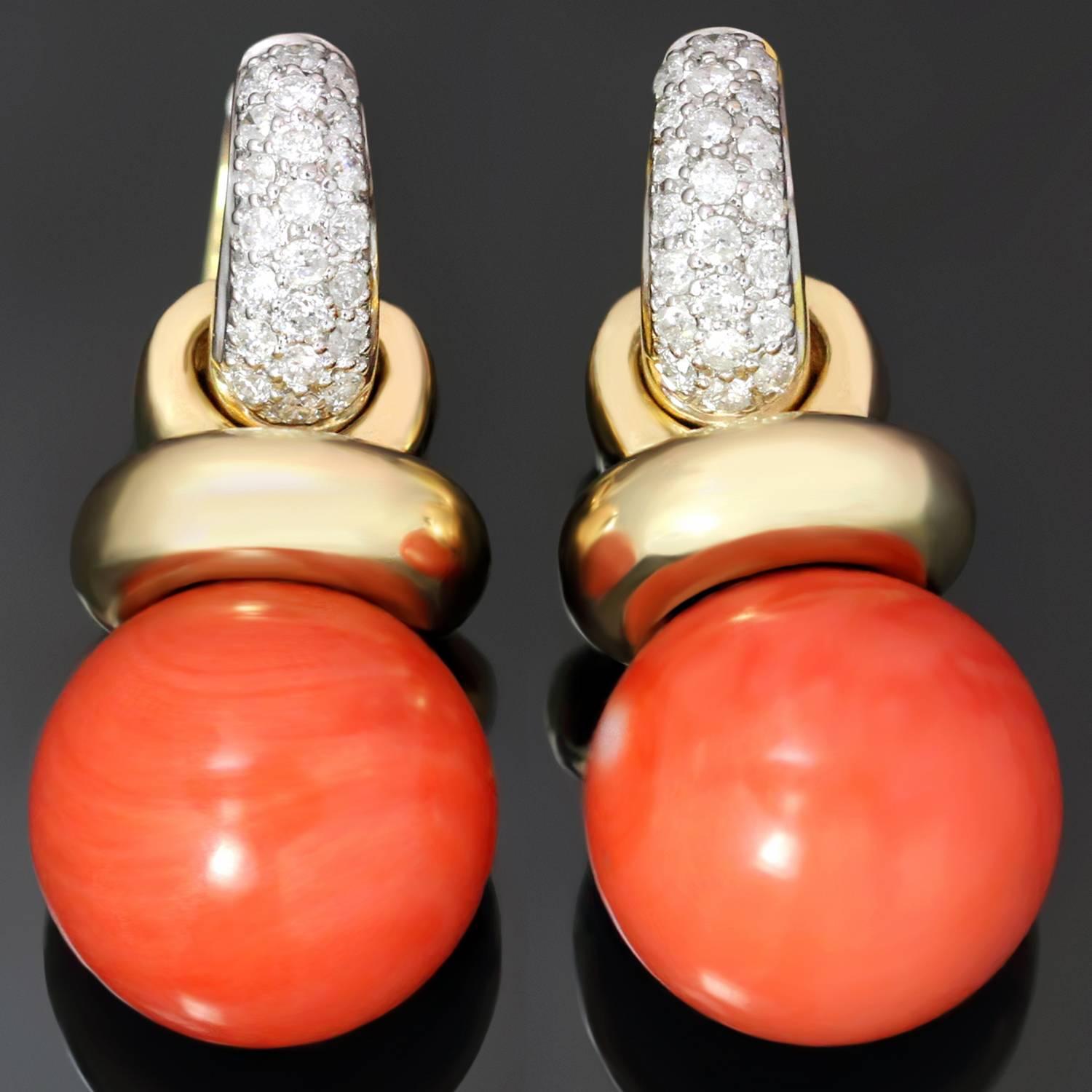 These fabulous versatile earrings feature a huggie design crafted in 14k yellow gold and set with sparkling round diamonds of an estimated 0.76 carats and completed with detached 18k yellow gold drops set with 13.5-14.0mm coral bead charms. Made in