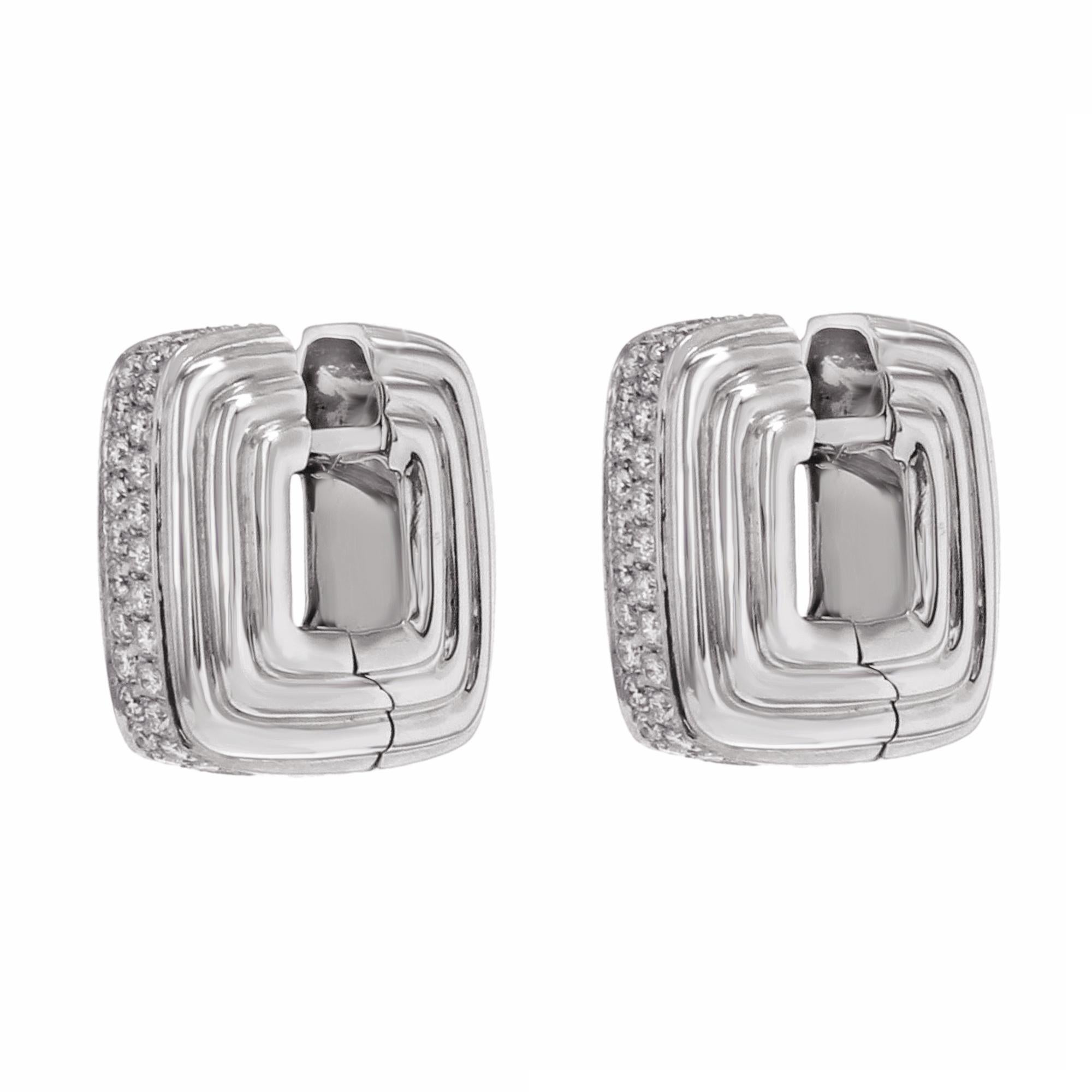 These earrings are new and made of 18K white gold and encrusted with 0.68 cttw diamonds. Length of the ring is 18mm, total weight 15.5 g. These earrings come in a nice presentation box with appraisal of authenticity.

Note: we would advise that