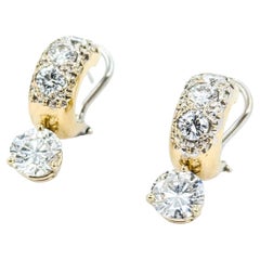 Orecchini Huggie con diamanti in oro giallo 14 carati