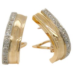 Diamond Huggie Earrings in 14k Yellow/White Gold Clip on Earrings. 0.60 Carats. Diamond Huggie Earrings in 14k Yellow/White Gold Clip on Earrings. 0.60 Carats.