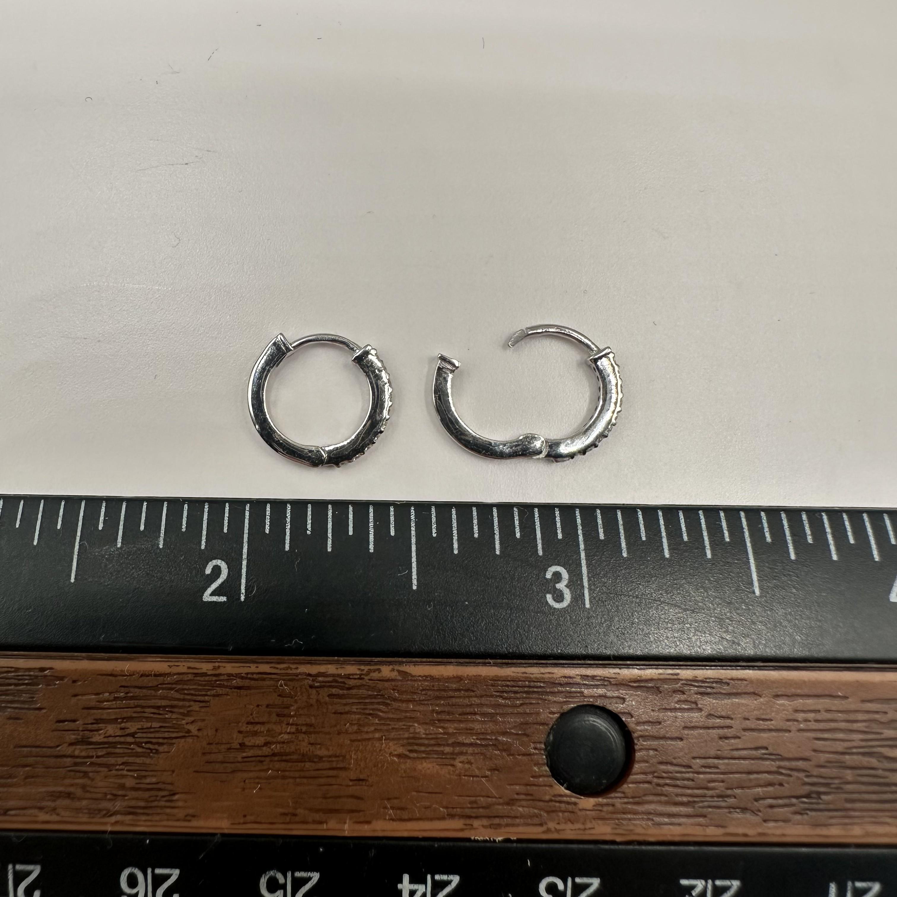 Diamond Huggie Earrings in 14kt White Gold - 0.10ctw GH SI Diamonds, 11.5mm In New Condition For Sale In West Hempstead, NY