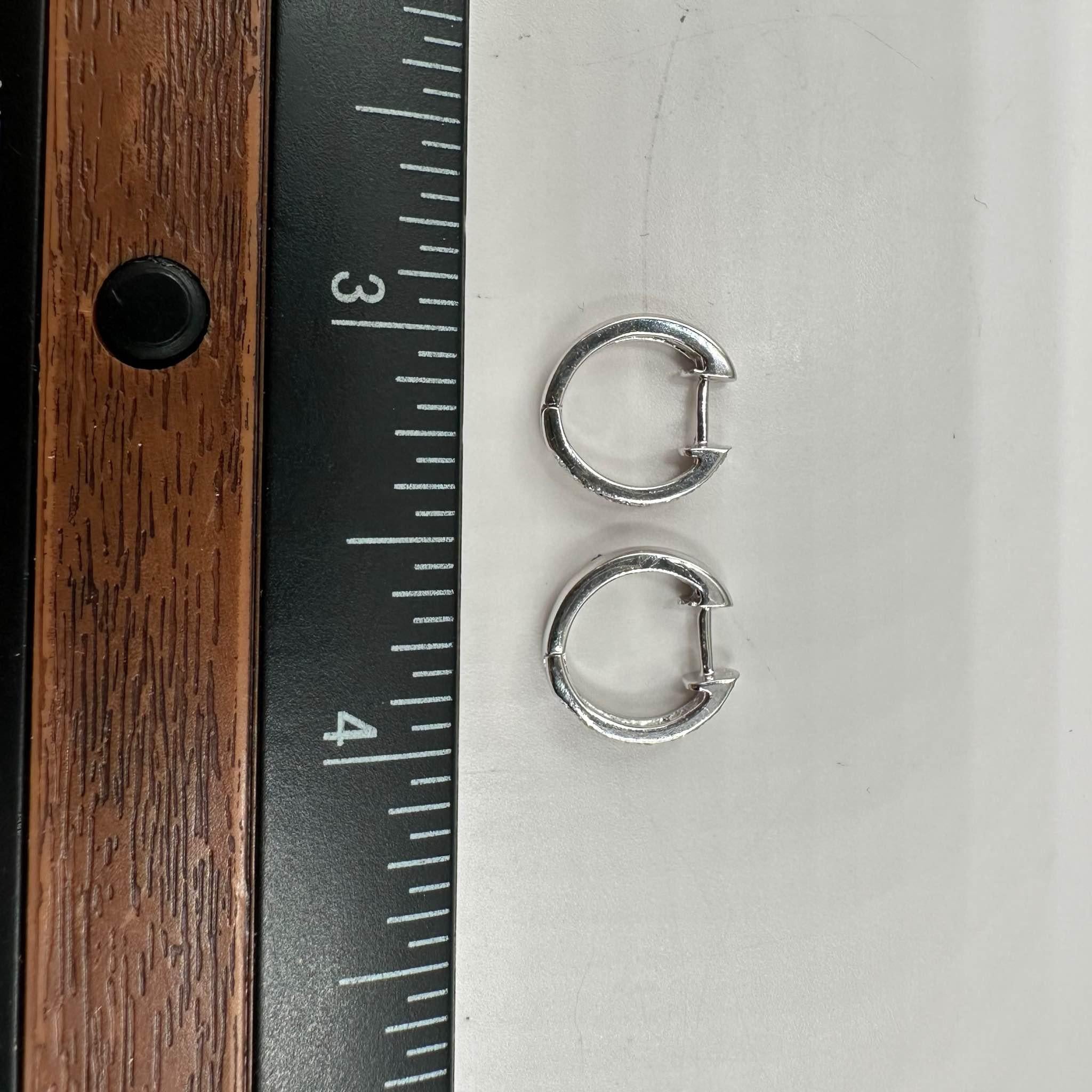 Women's Diamond Huggie Earrings in 14kt White Gold - 0.15ctw GH I1 Diamonds, 12mm For Sale