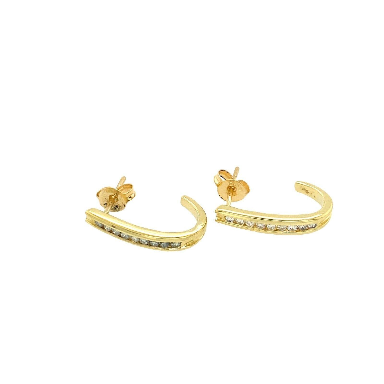 The earrings are a great choice for women who love to wear jewellery that is both classy and elegant. This pair is set in 18ct yellow gold set in 0.25ct of round brilliant cut diamonds.

Additional Information:
Total Diamond Weight: 0.25ct
Diamond