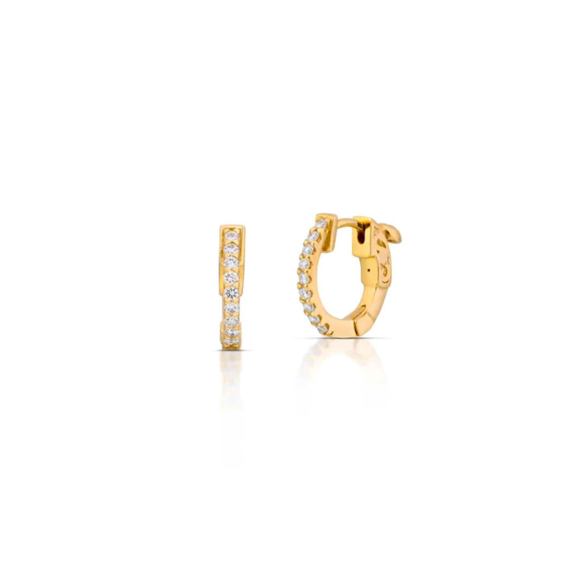 Elegant and effortless, these classic diamond huggie earrings are crafted in 14K white gold and set with 0.41 carats of natural round brilliant diamonds. Designed for daily luxury, each earring features a seamless row of G/H color, SI clarity