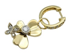 Diamond Huggie Hoops with Flower and Butterfly Dangle in 14 Karat Yellow Gold