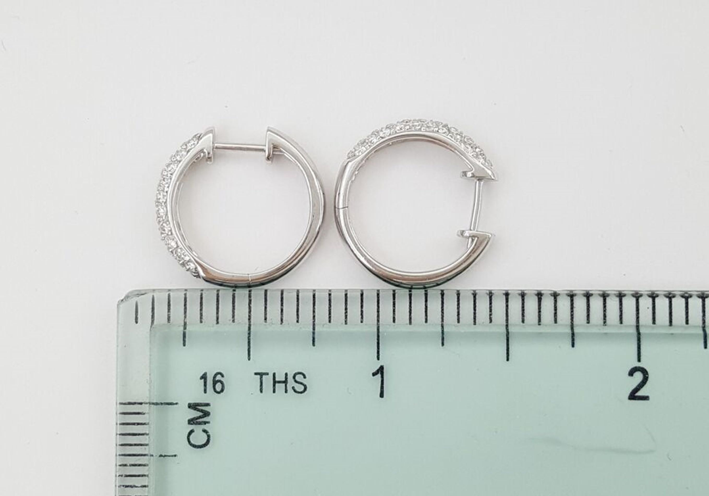 Round Cut Diamond Huggies Earrings For Sale