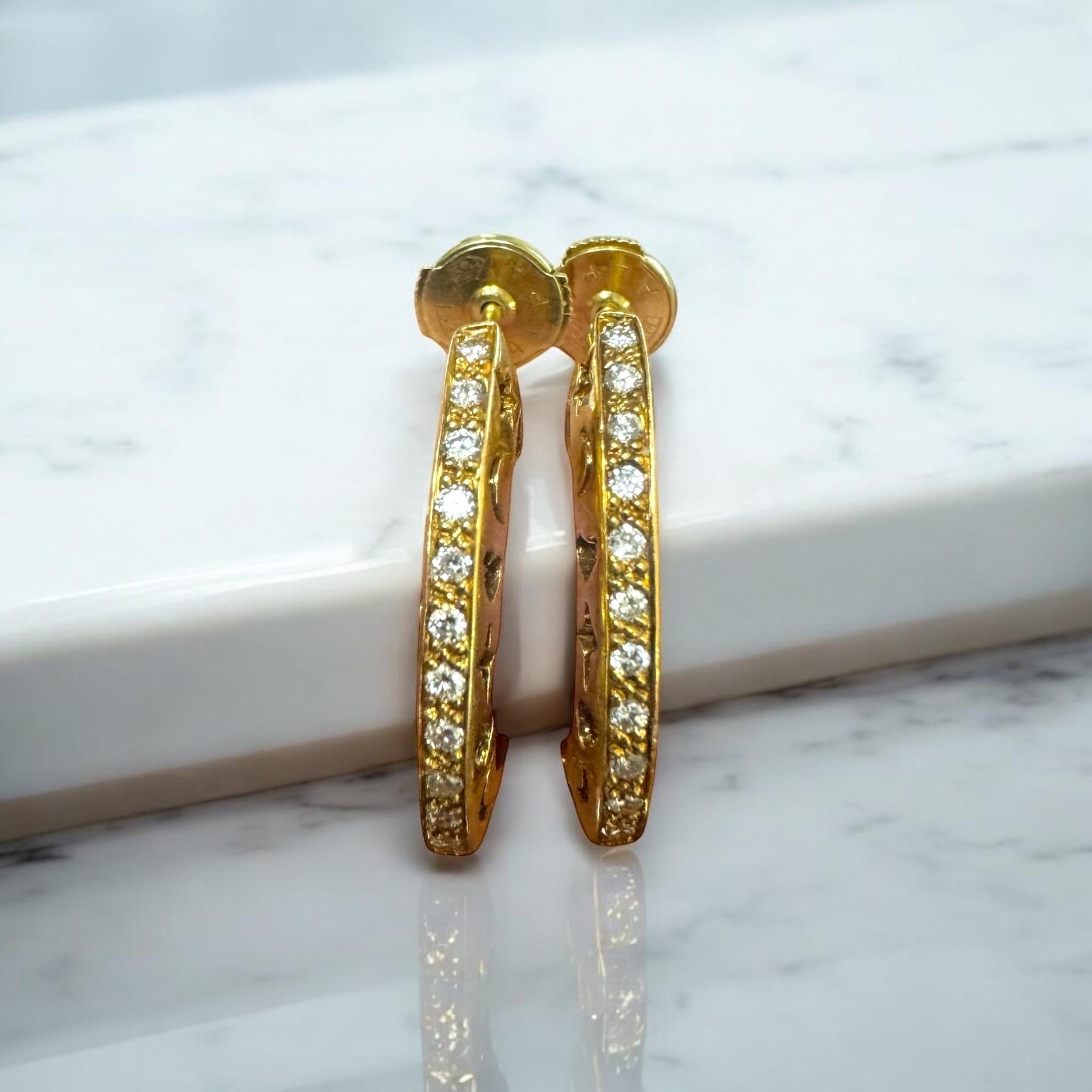 These lovely diamond earrings are so detailed!!

Earring Details
Material: 18K Yellow Gold
Drop Length: 3/4 Inch
Width: 3mm
Weight: 4.6 Grams

Accented by the following gemstones
26 - 1.5mm Round Brilliant Cut Diamonds; GH Color; SI Clarity;