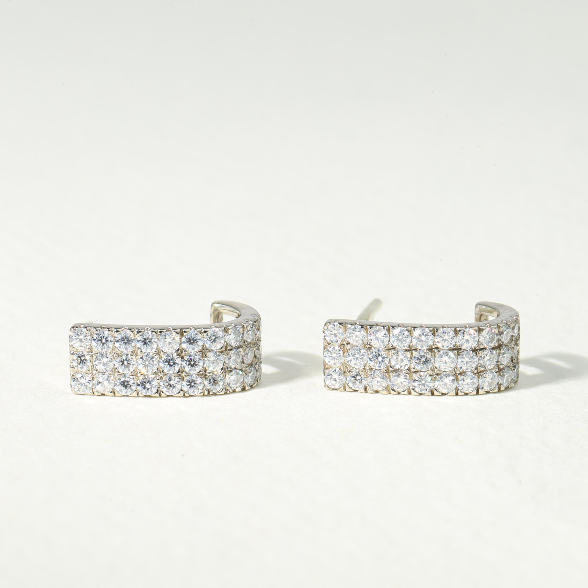 Diamond Iced Out Hoop Huggie Stud Earrings with E VS Diamonds 

Available in 18k white gold.

Same design can be made also with other custom gemstones per request.

Product details:

- Solid gold 18k Yellow Gold 

- approx. 1.3mm diamond ( E color,