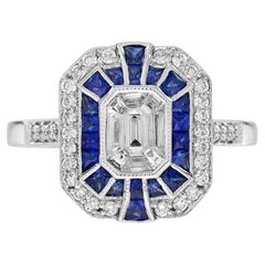 Anello con diamante e zaffiro blu incastonato in stile Art Deco in oro bianco 18 carati