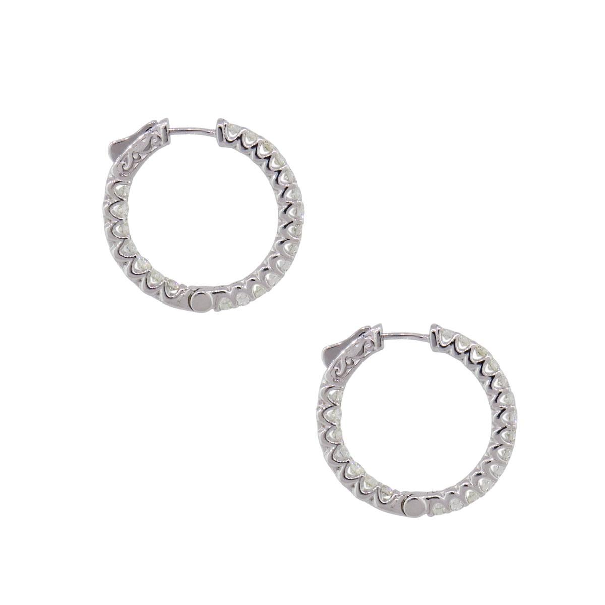 Material: 14k white gold
Diamond Details: Approximately 2.05ctw of round brilliant diamonds. Diamonds are G/H in color and VS in clarity.
Measurements: 1″ x 0.14″ x 1″
Earrings Backs: Hoop
Total Weight: 8.1g (5.2dwt)
Additional Details: This item