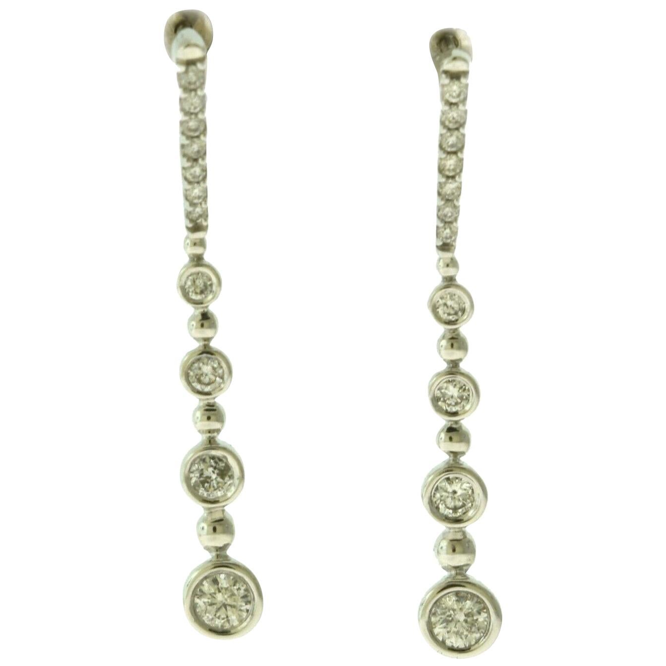 Diamond in White Gold Four Bezel Drop Line Earrings For Sale
