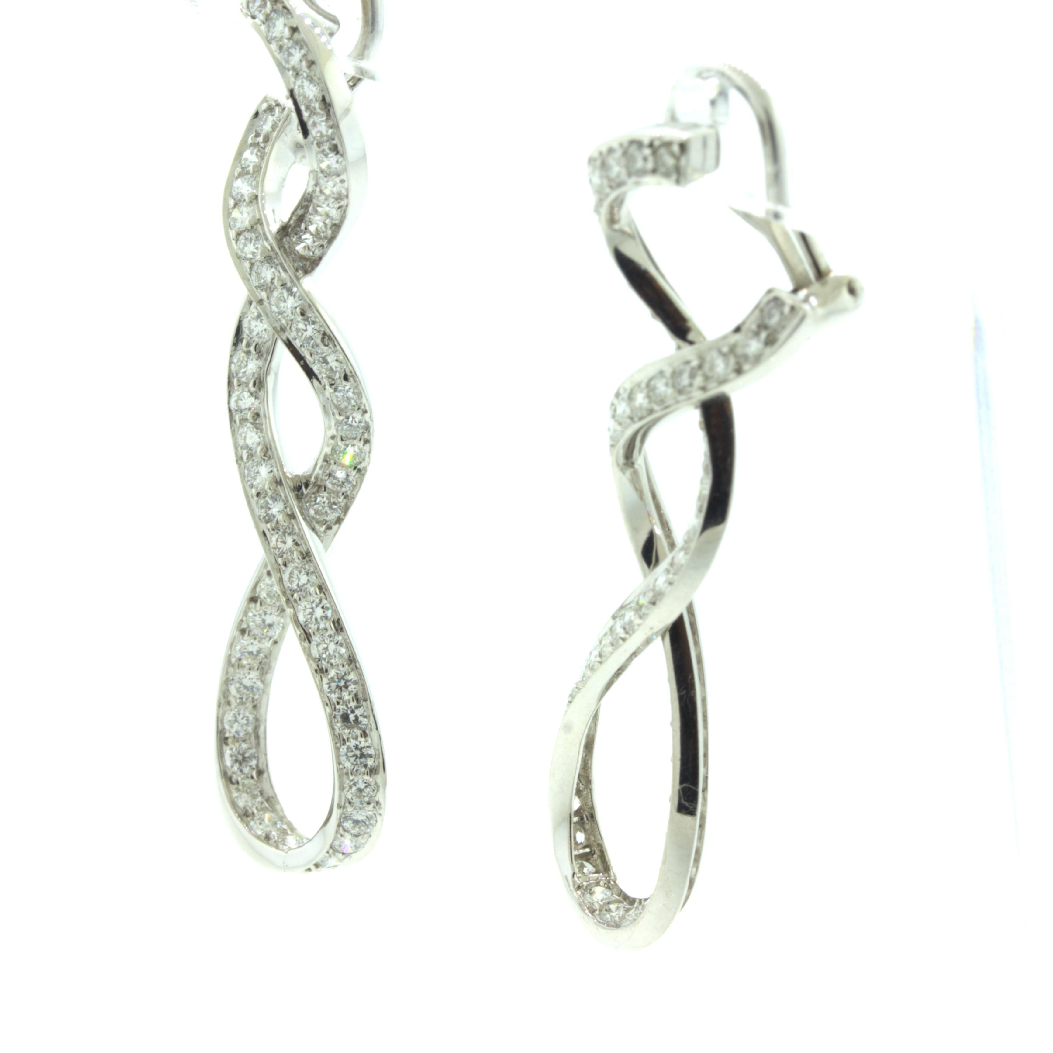 Diamond Infiniti 18k White Gold Clip-On Earrings For Sale 1