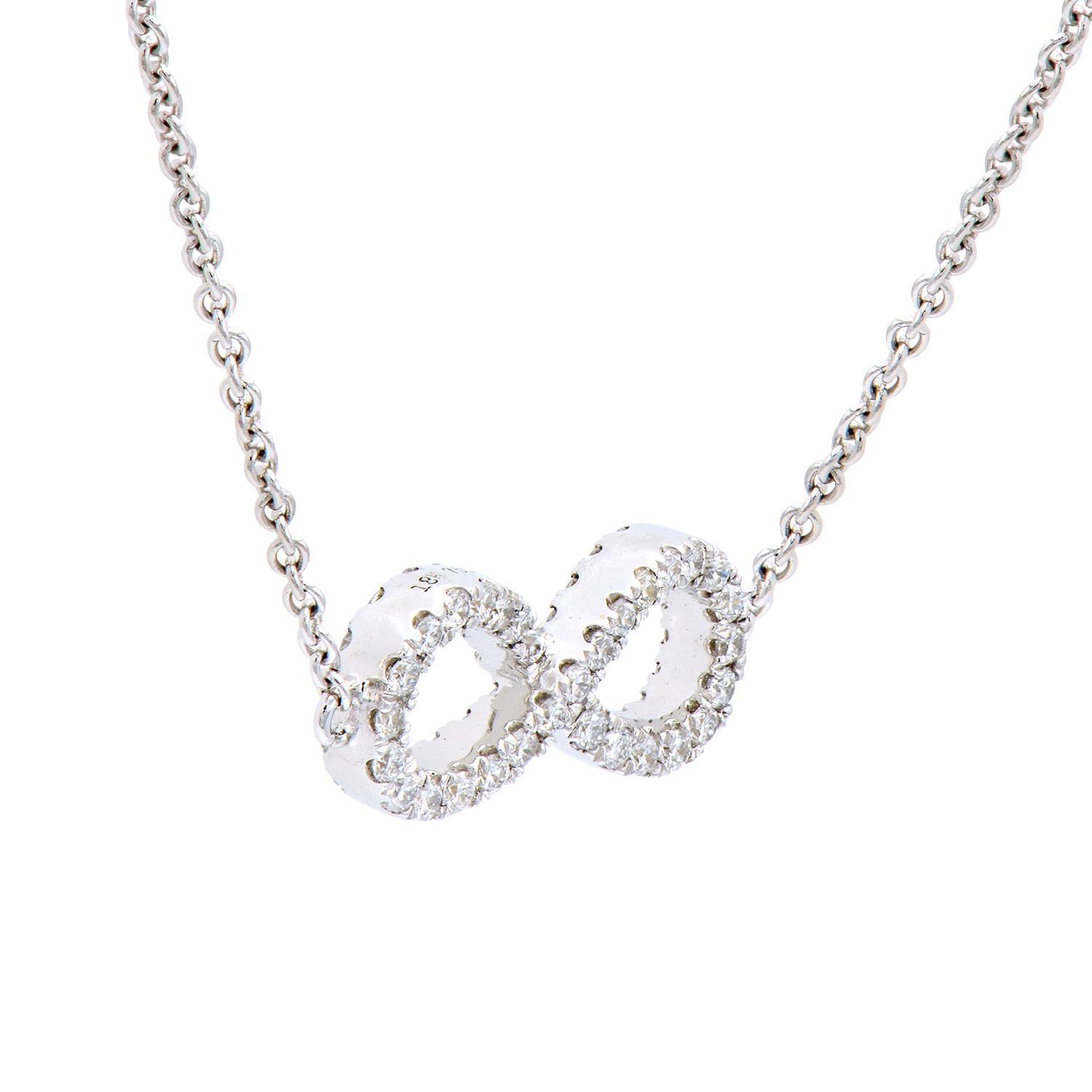 Show that your love and friendship is forever with this diamond infinity necklace. This 3.0 grams of white gold necklace contains 62 round VS2, G color diamonds which total 0.40 carats of beautiful sparkling diamonds. It comes with an 18
