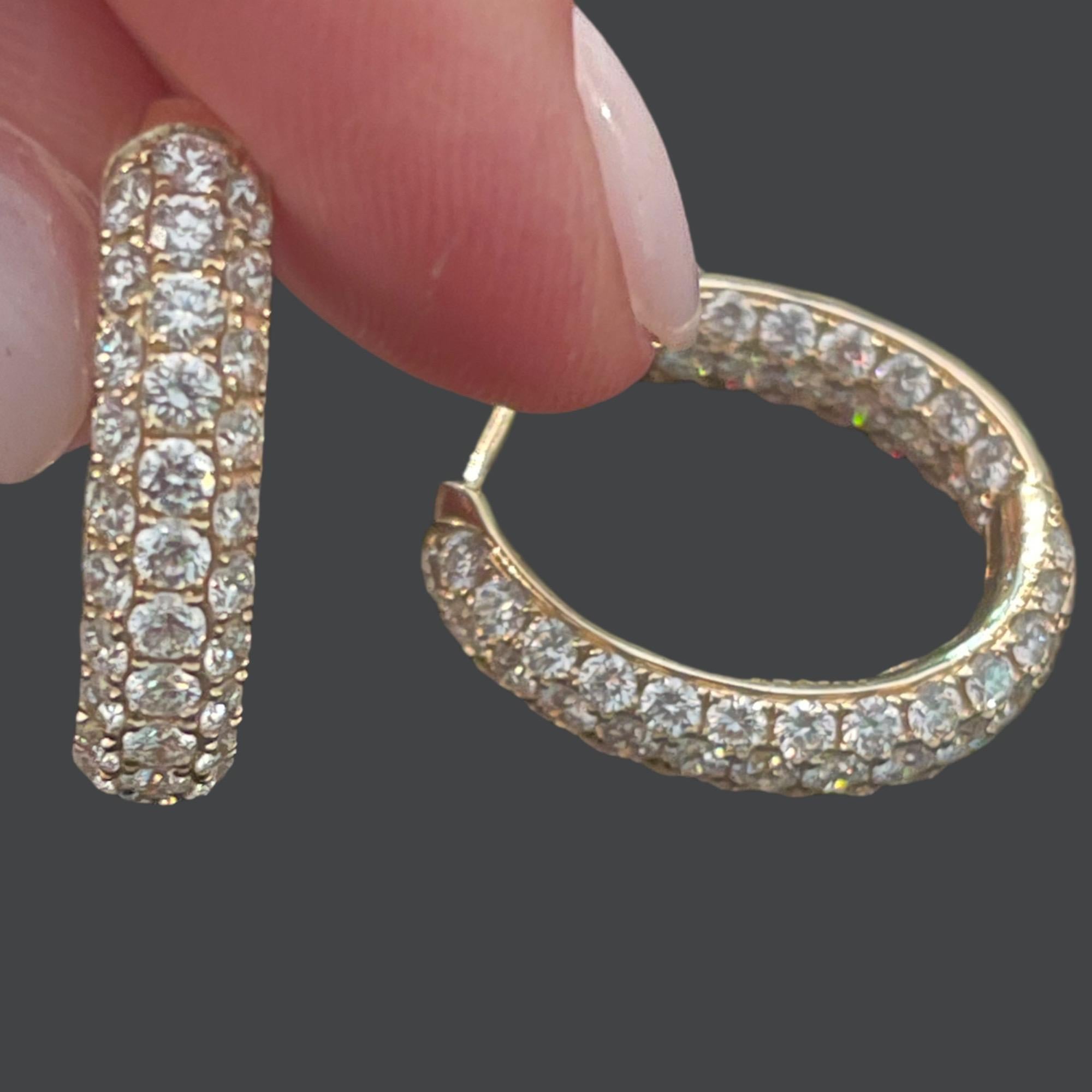 The perfect earring for day or night. These classic yellow gold diamond pave inside out hoops and just the right amount of sparkle to any outfit. With easy but secure closures that make them a breeze to put on and stay on. These earrings have a