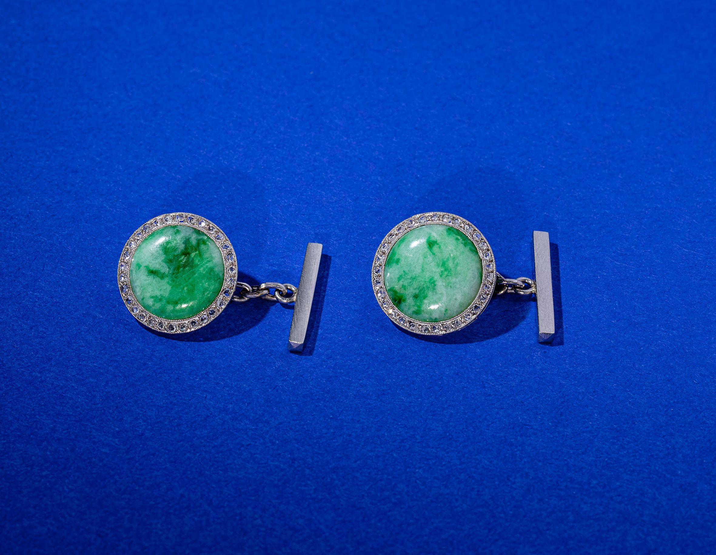 Gorgeous cufflinks made of Platinum with jade cabochons framed by rose-cut diamonds.
Early 20th century, French assay marks and maker's mark.
