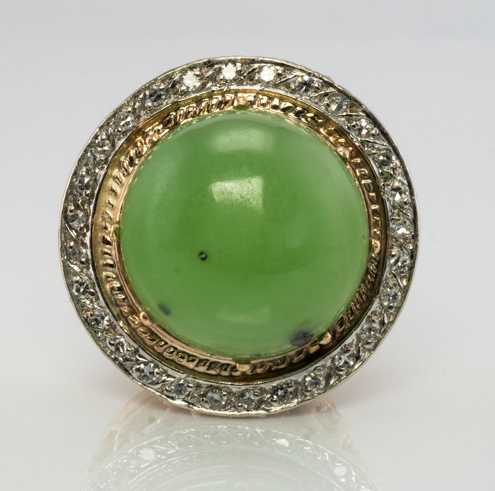 Diamond Jade Ring Cabochon 14K Gold Vintage

This terrific vintage ring is finely crafted in solid 14K Yellow gold (carefully tested and guaranteed) and set with Natural Jade and single cut Diamonds. There are 28 single cut diamonds set in white