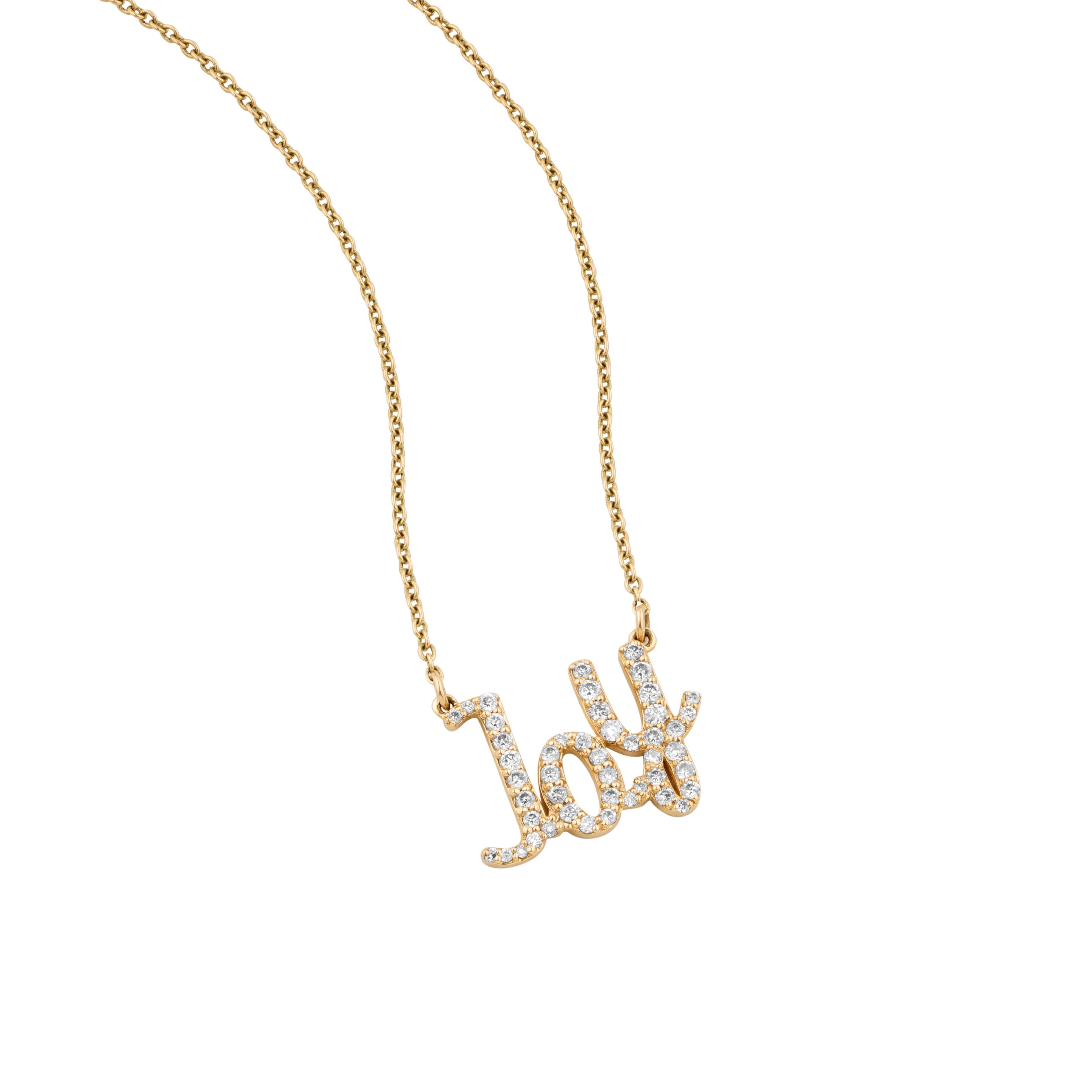 The Diamond Joy Pendant Necklace is a radiant addition to any jewellery collection. Crafted in warm gold with scattered diamonds, it sparkles from every angle. This piece is not just a fashion statement but a celebration of life's joyful moments. It