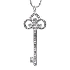 Diamond Key Amulet Pendant in Platinum on a Wheat Platinum Chain