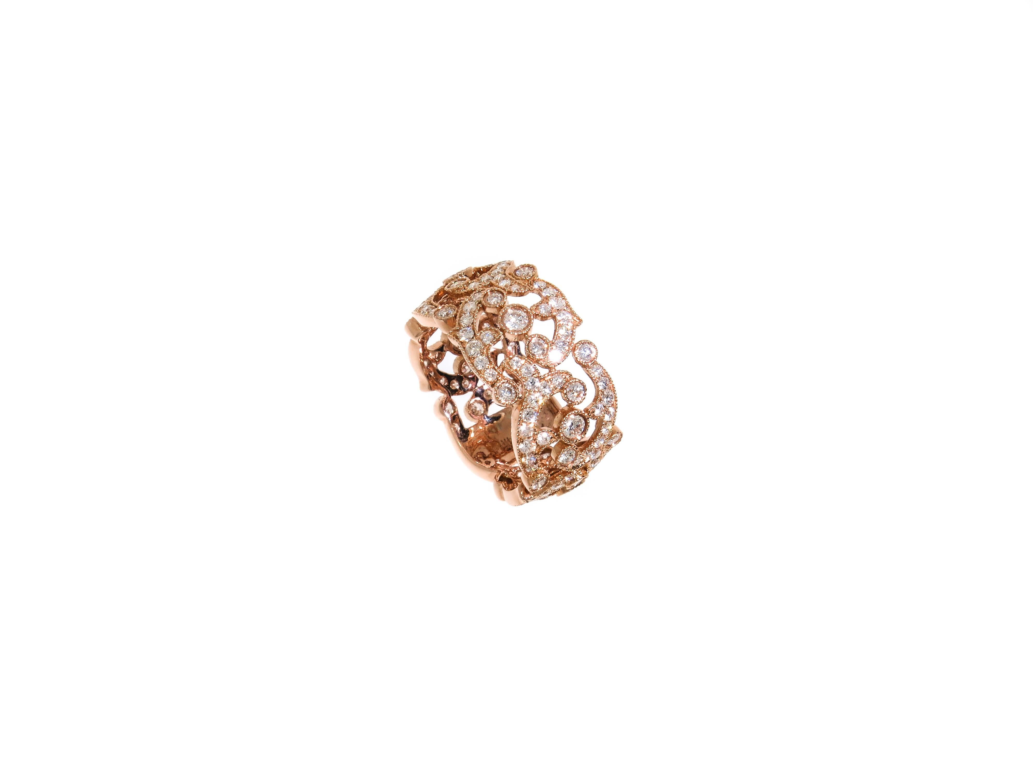 An eye-catching and wearable heirloom-quality jewelry. It is a soft net of gold adorned with diamonds to create a play of fullness and emptiness
This beautiful rose gold laced band, is handcrafted in 14k rose gold with white round diamonds (0.50