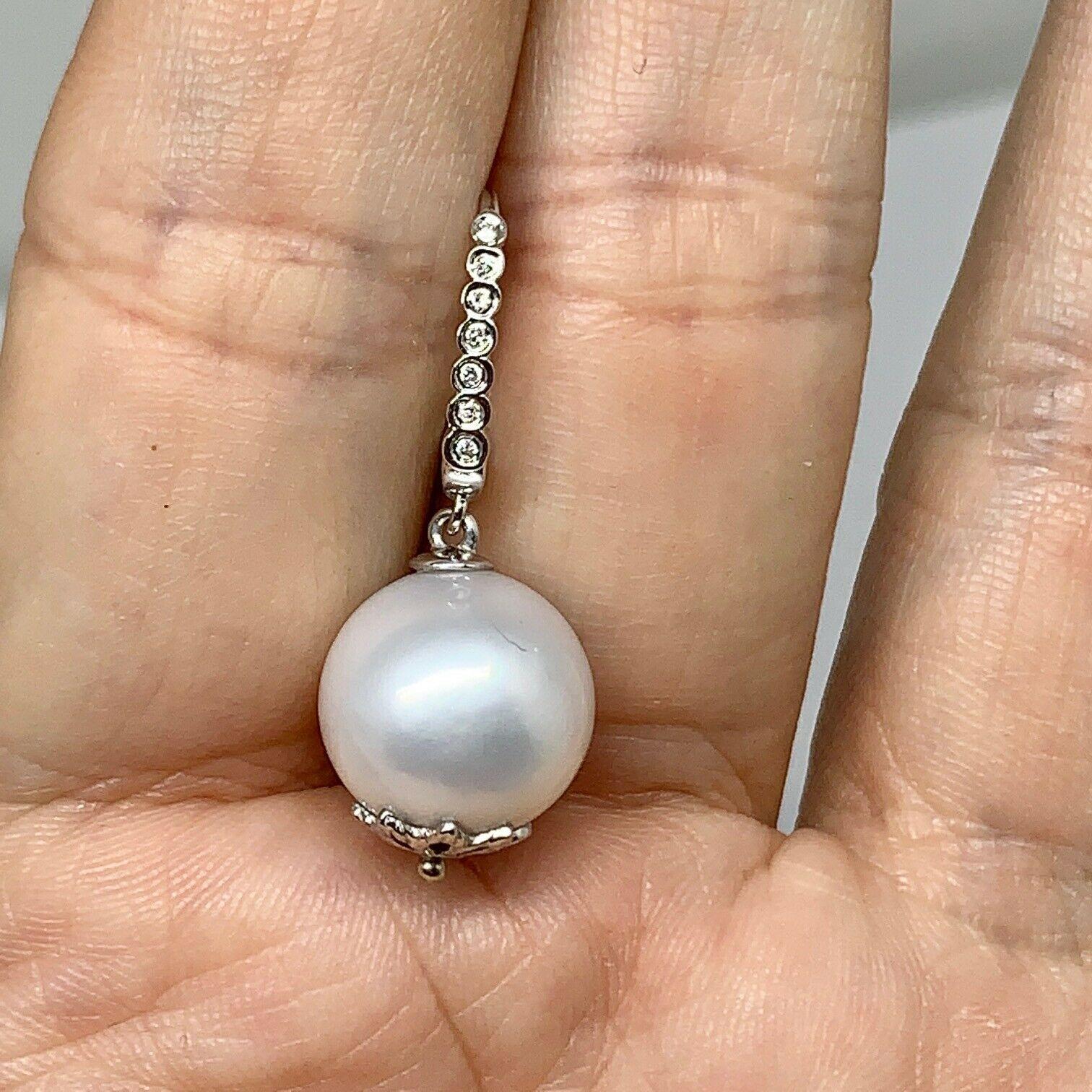 Taille ronde Boucles d'oreilles en or 14 carats avec grande perle des mers du Sud et diamants de 13 mm certifiés en vente