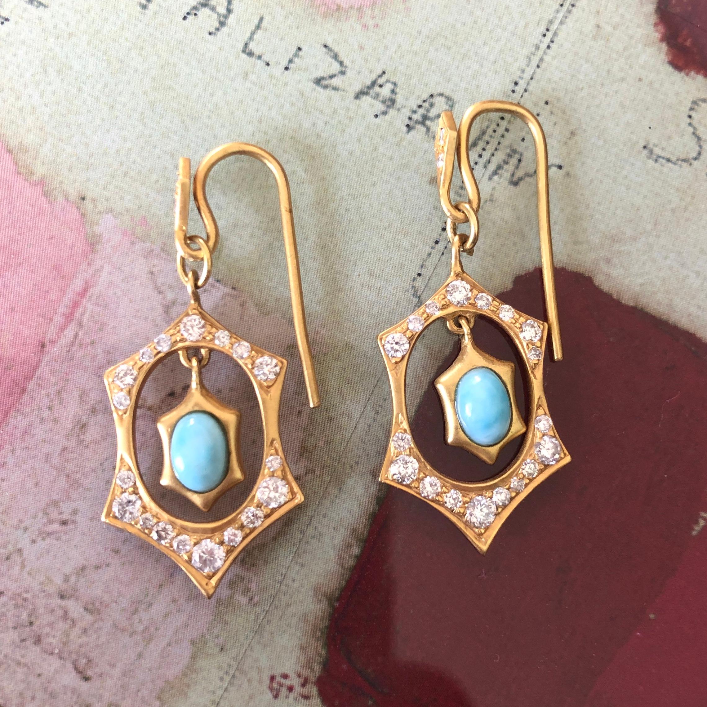 Brilliant Diamonds and bright Larimar ovals are set in these 18kt Gold Earrings by award winning jewelry designer, Lauren Harper.  The center stone, Larimar, has light turquoise color, and is a natural rare gemstone that is from the Dominican