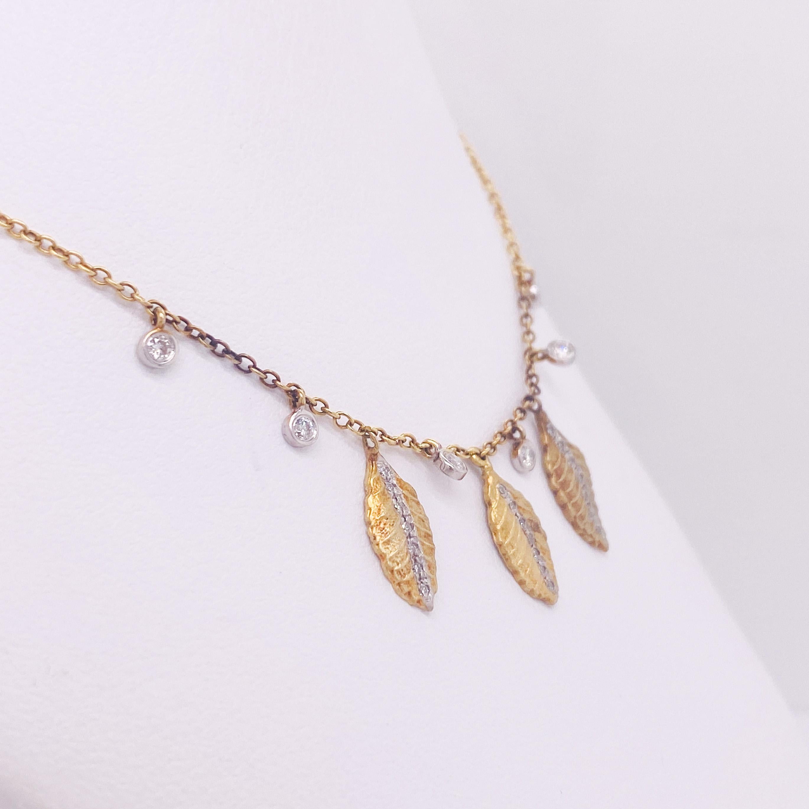 If you like artisan style pieces then this necklace is for you! The 18 karat yellow gold charms fall gracefully on your chest. The diamonds that separate the leaves and add a touch of sparkle are the excellent touch that completes this necklace and