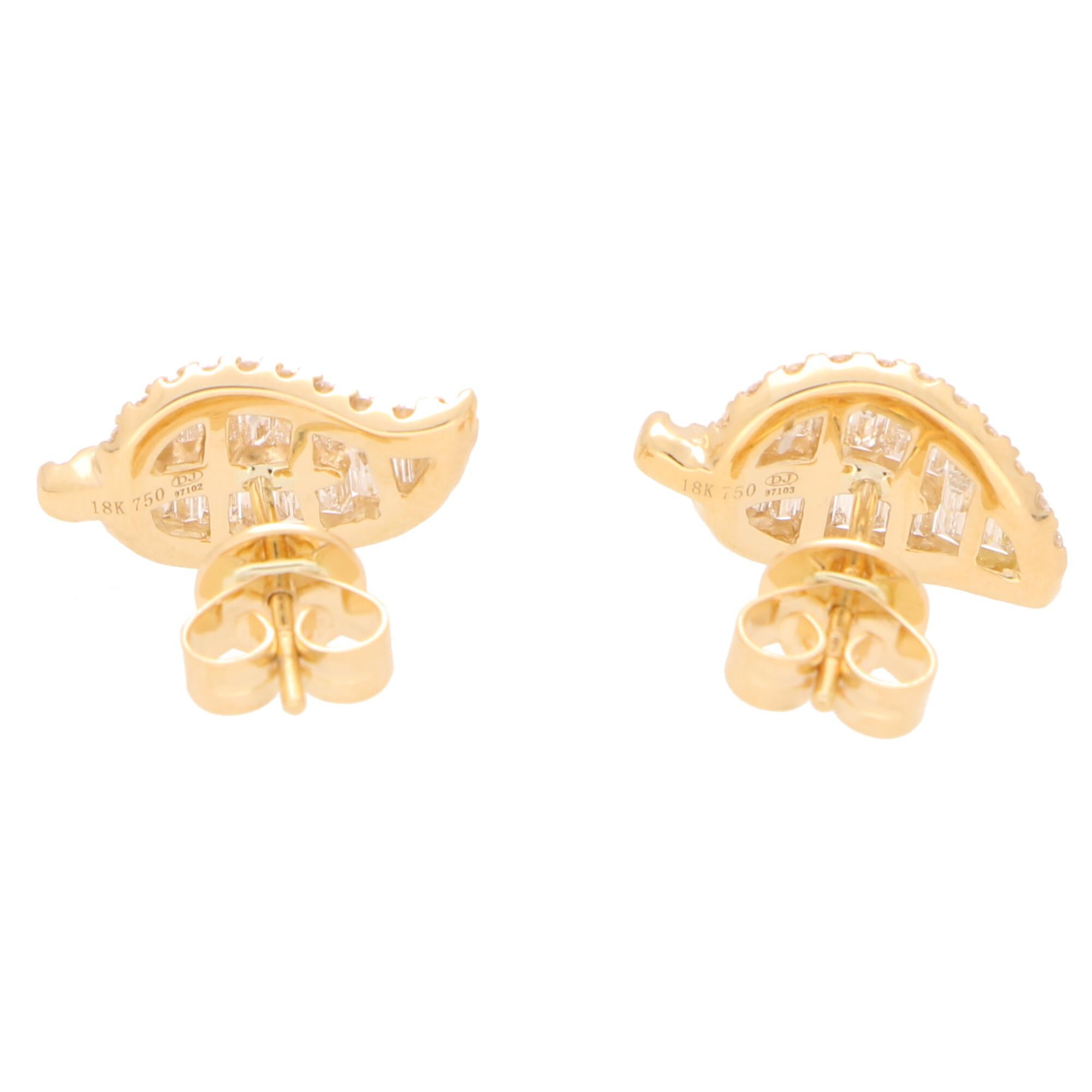 Baguette Cut Diamond Leaf Stud Earrings Set in 18 Karat Yellow Gold For Sale