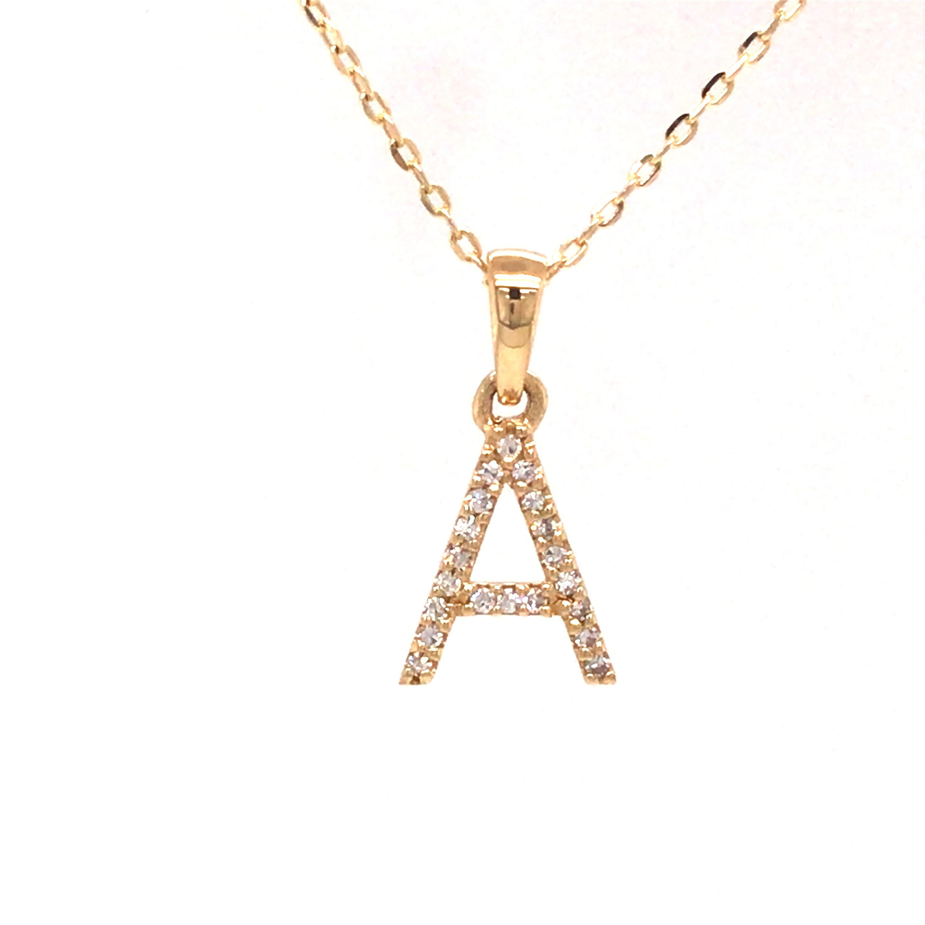 Diamond Letter 'A' Necklace in 14K Yellow Gold. Round Brilliant Cut Diamonds weighing 0.06 carat total weight, G-H in color and VS-SI in clarity are expertly set.  The Necklace measures 16 inch in length and the pendant measures 1/2 inch in length. 