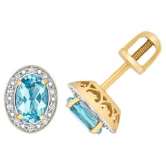 DIAMOND & Hell SWISS BLUE TOPAZ OVAL CLUSTER STUDS IN 9CT Gold