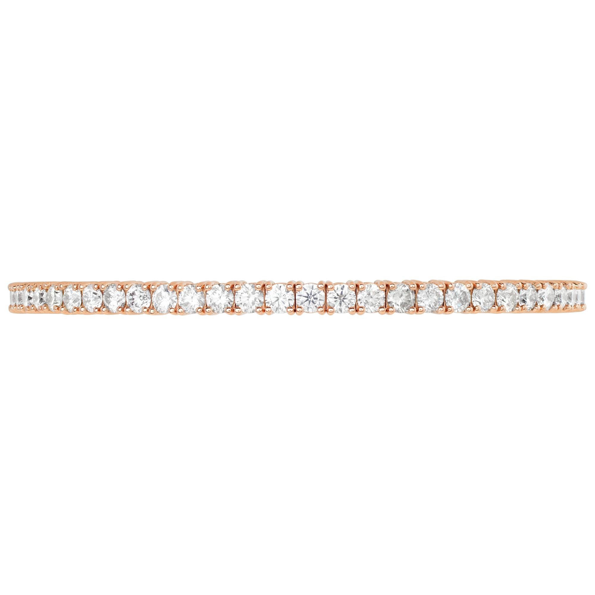 Flexible diamond line bangle bracelet  in 14k rose gold with approximately 6.25 carats in round diamonds (H-I color, SI clarity). 3.5 mm width.