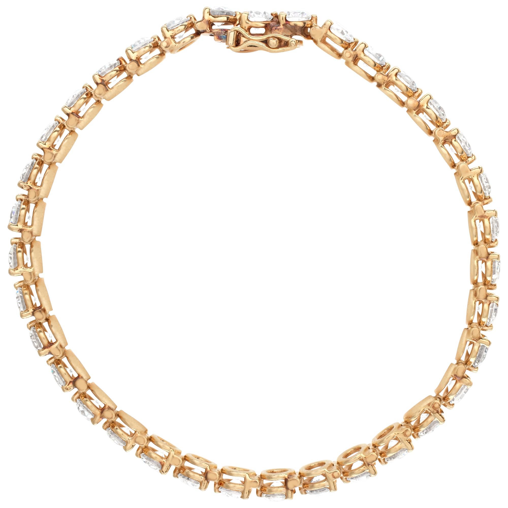 Diamond line bracelet in 14k yellow gold with approximately 10 carats in diamond 1