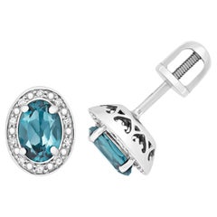 DIAMANT & LONDON BLUE TOPAZ OVAL CLUSTER STUDS IN 9CT WHITE Gold