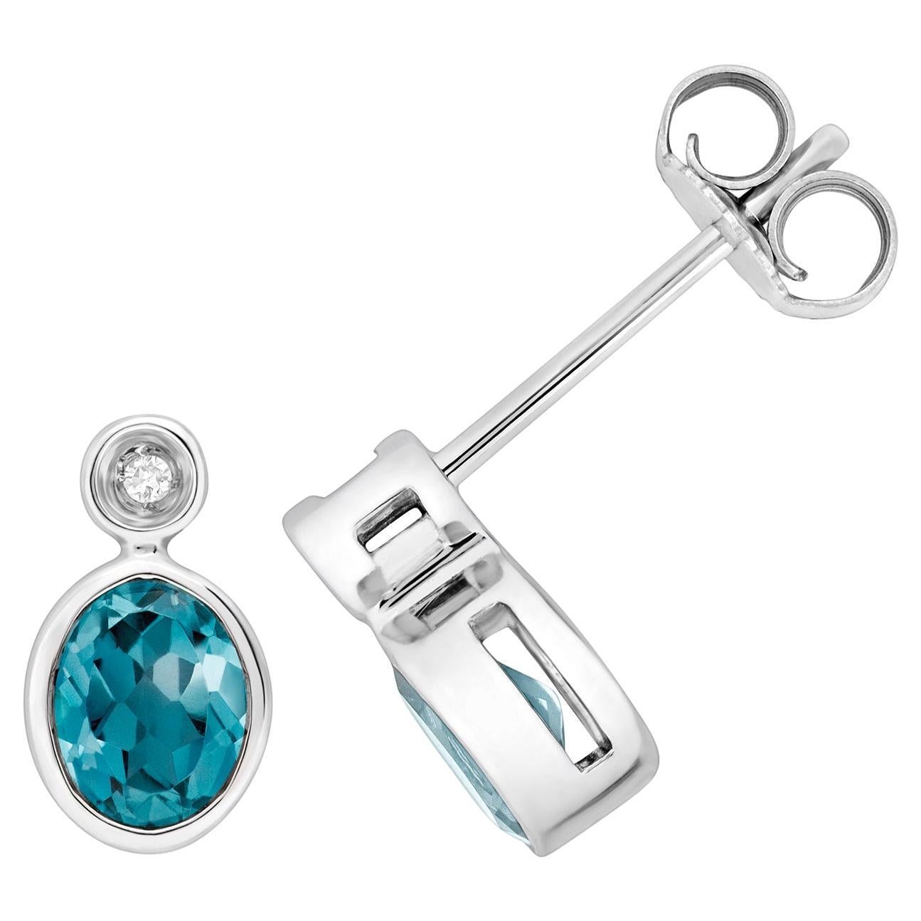 DIAMOND & LONDON BLUE TOPAZ OVAL RUBOVER STUDS IN 9CT WHITE Gold For Sale