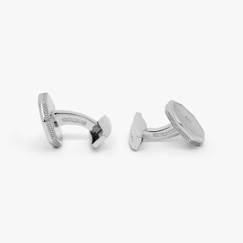 Diamond London Eye Cufflinks with White Mother of Pearl in Sterling Silver

Unusual octagonal shapes are set in a rhodium-plated sterling silver case, surrounding a white mother of pearl surface. Each cufflink features a central brilliant-cut 0.03