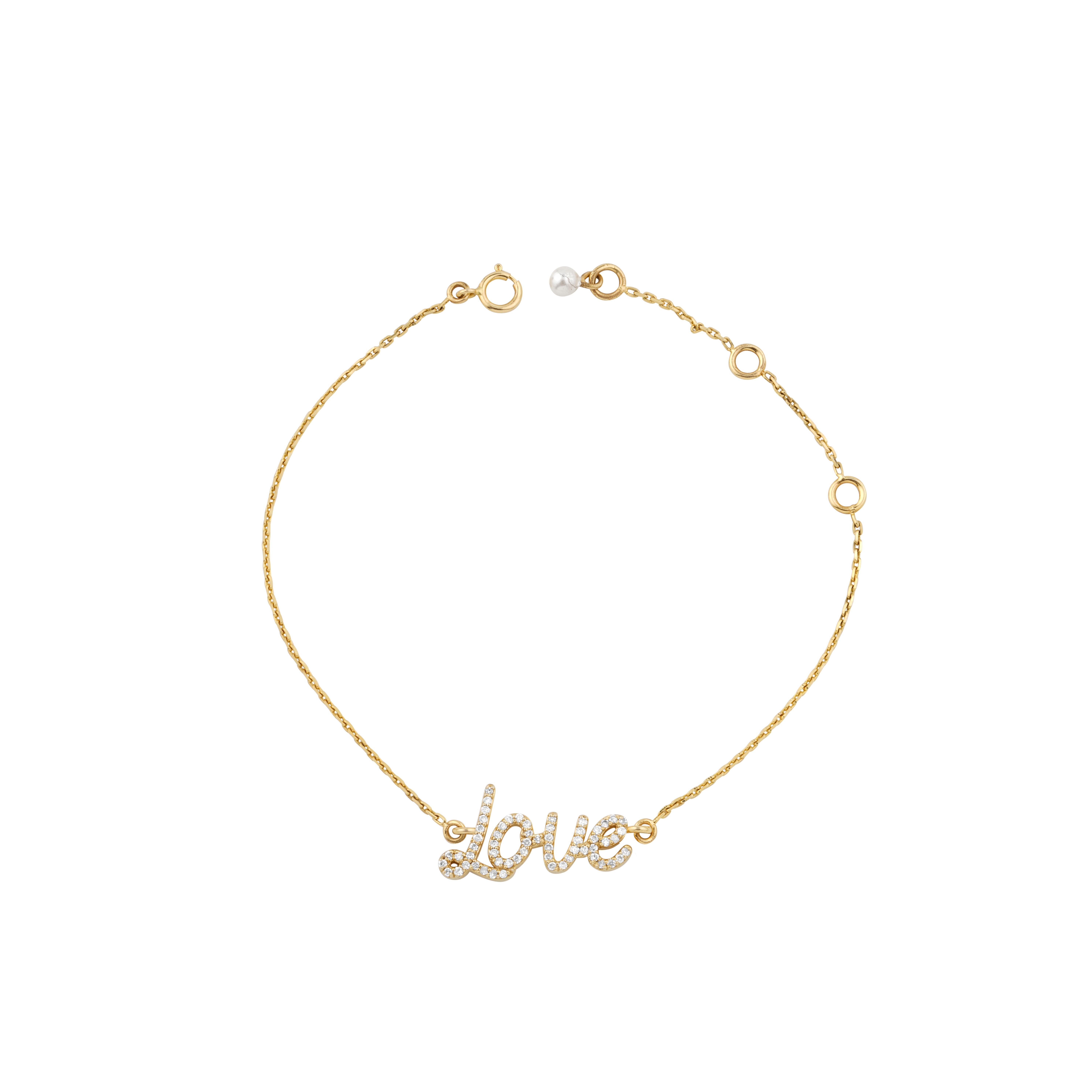 Diamond Love Charm Bracelet is an elegant bracelet, likely a fine jewelry piece, with the word 