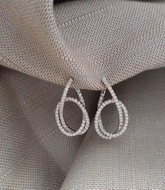 Diamond Love Knot Earrings in 18K White Gold Settings