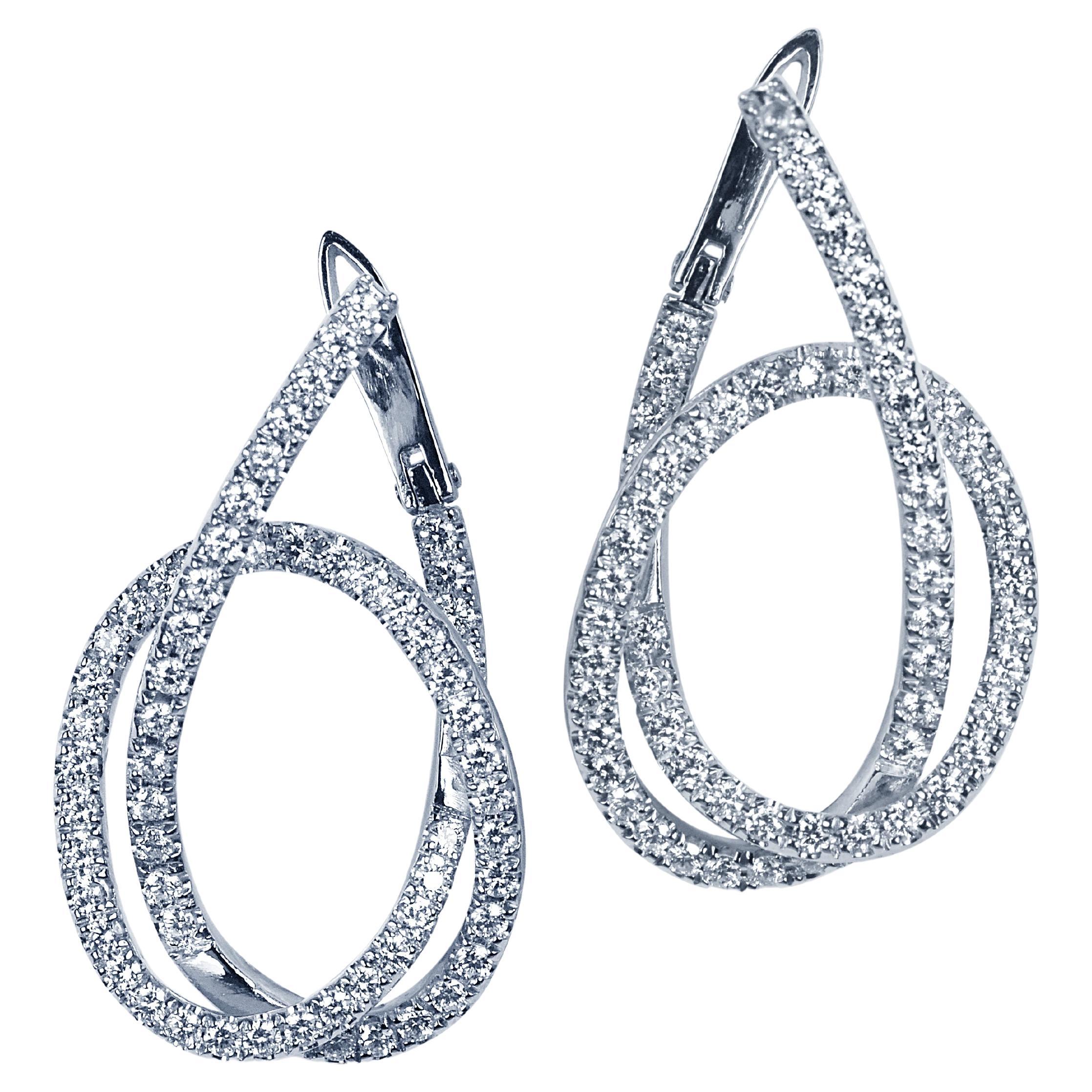 Diamond Love Knot Earrings in 18K White Gold Settings For Sale