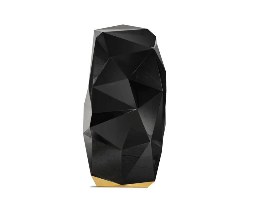 The Diamond floor safe reinterprets the quintessential diamond shape throughout contemporary design, a beautiful outcome of architectural thinking with elegant faceted lines. With a structure built in wood and finished in fine oriental black lacquer