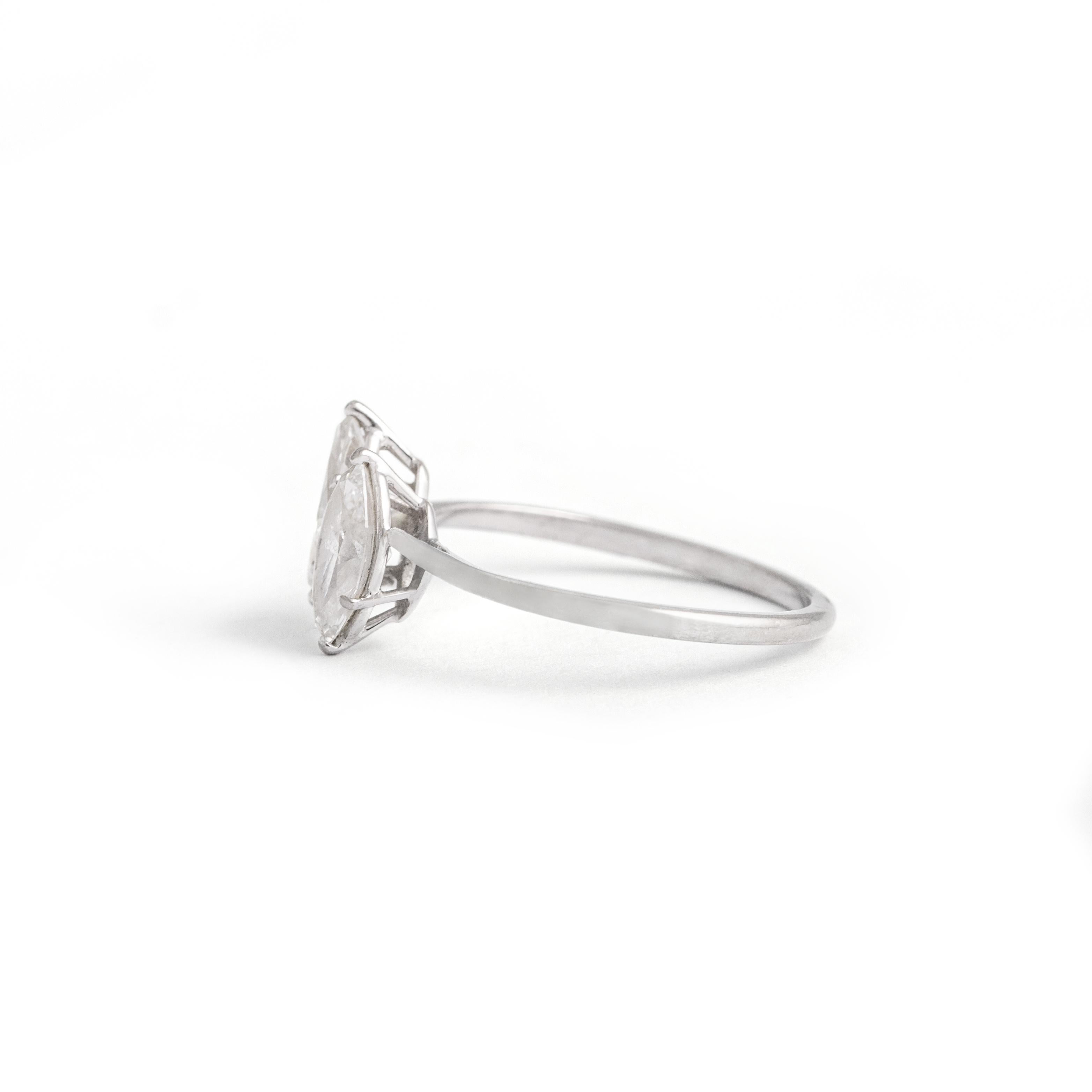 Two Diamonds Marquise shape on White Gold Ring.
Size: 6.5 US.
Total weight: 1.93 grams.